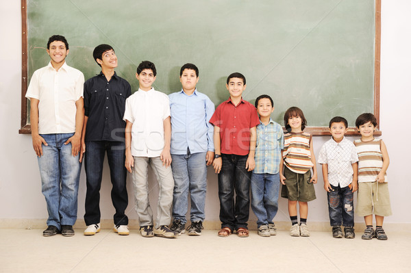 Colegiu băieţi imbatranire zâmbet şcoală Imagine de stoc © zurijeta