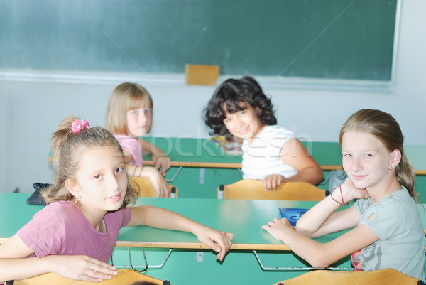 Stock photo: Pupil activities in the classroom at school
