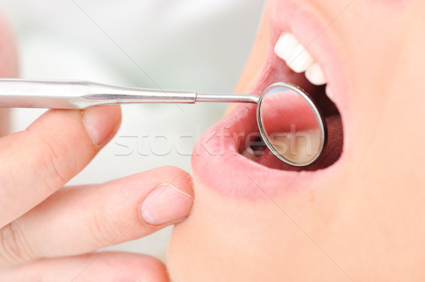 Dentist's teeth checkup, series of related photos Stock photo © zurijeta