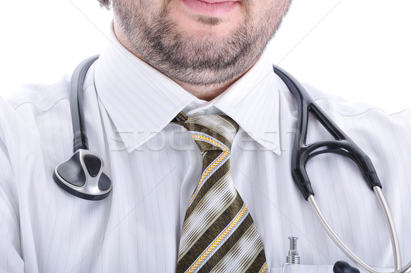 Young attractive male doctor in characteristic clothes Stock photo © zurijeta