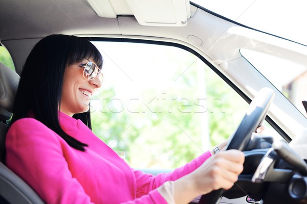 [[stock_photo]]: Femme · d'affaires · conduite · voiture · femme · main · heureux