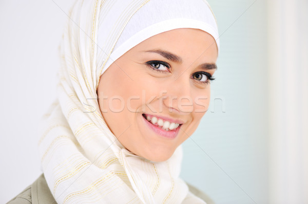 Happy Muslim beautiful woman smiling Stock photo © zurijeta