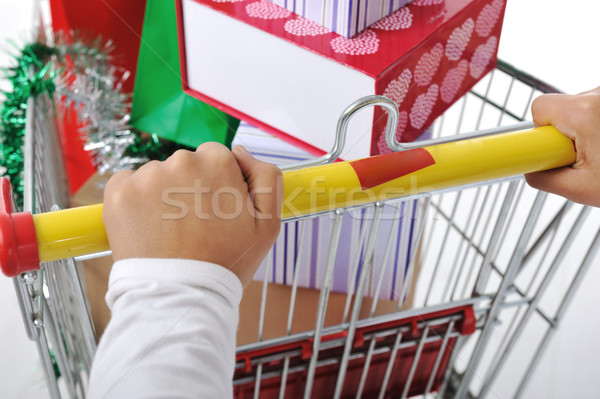 Woman in shoping pushing cart with bags and boxes Stock photo © zurijeta