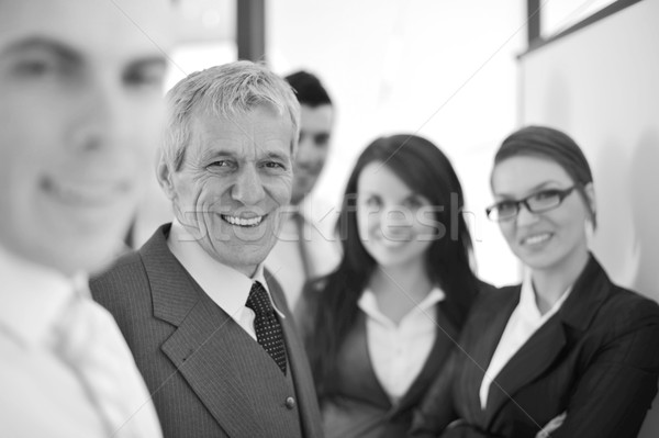 Small business team in the office in front of a whiteboard Stock photo © zurijeta