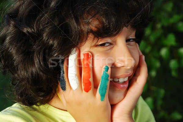 Stock photo: Several colors on children fingers, outdoor