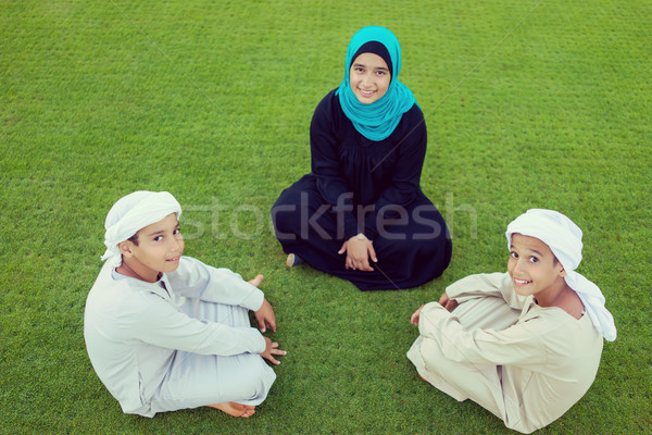 Happy Muslim Arabic family on summer vacation Stock photo © zurijeta