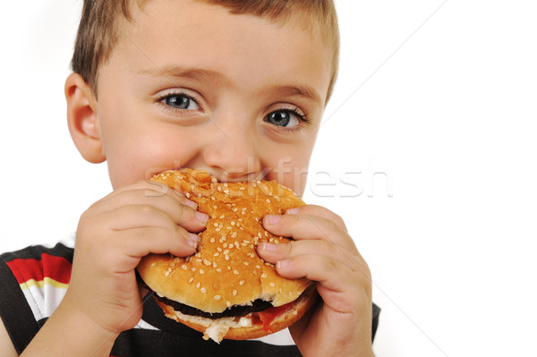 Boy eating burger Stock photo © zurijeta