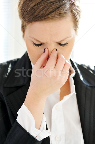 Young depresses stressed business woman at office Stock photo © zurijeta