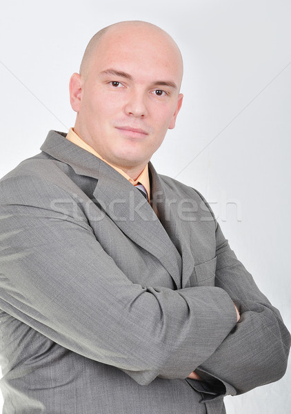 Young attractive businessman on white background Stock photo © zurijeta