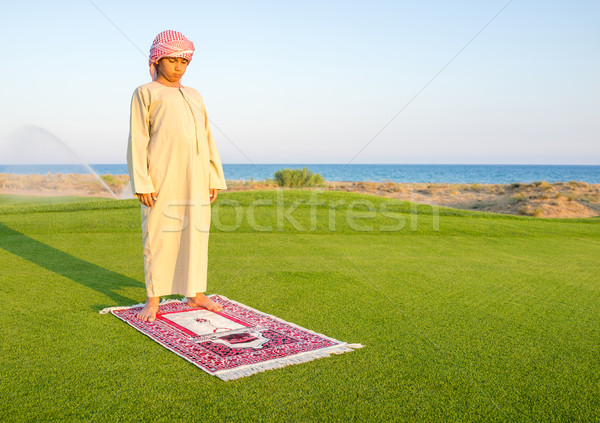 Musulmans arabe garçon prière vert prairie [[stock_photo]] © zurijeta