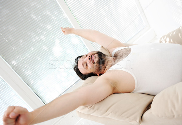 Nyugodt férfi otthon ablak alszik állás Stock fotó © zurijeta