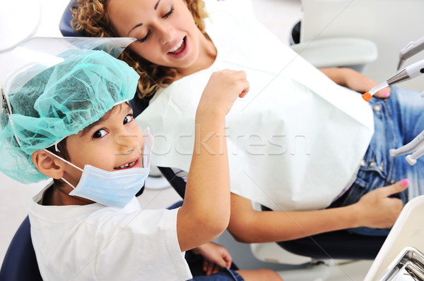 Little boy Dentist's teeth checkup, series of related photos Stock photo © zurijeta