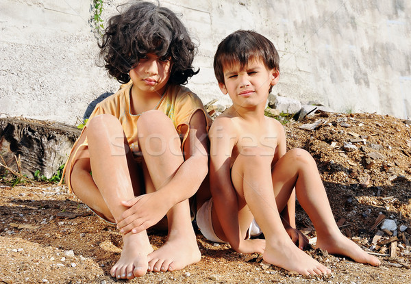 Poverty and poorness on the expression of children Stock photo © zurijeta