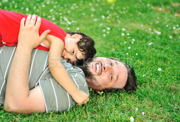 Apa fia együtt föld férfi boldog gyermek Stock fotó © zurijeta