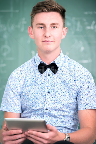 Smart student with bowtie Stock photo © zurijeta