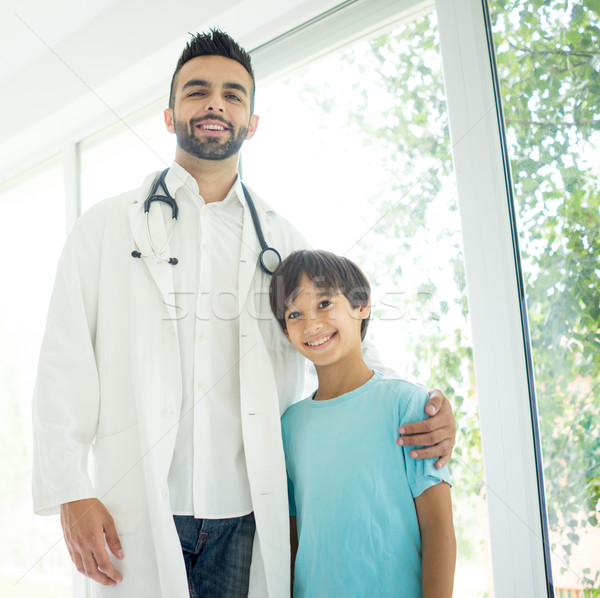 Doctor examining a boy at hospital Stock photo © zurijeta