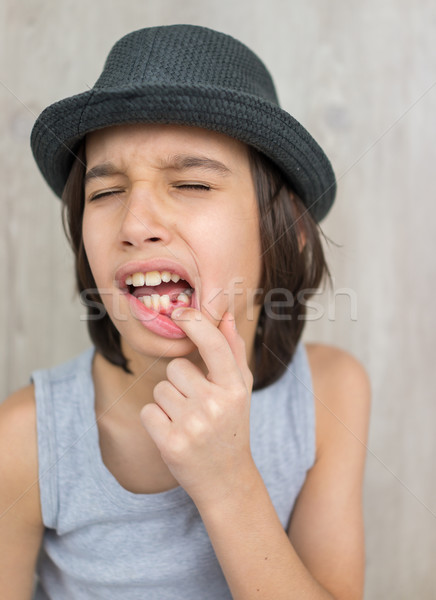 Happy little kid with tooth down Stock photo © zurijeta