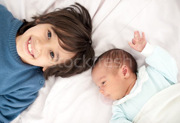 Stock photo: Newborn baby with bigger brother
