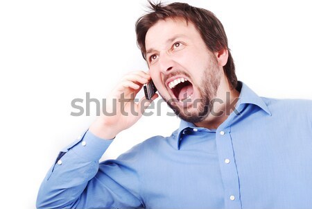 Angry man and phone Stock photo © zurijeta