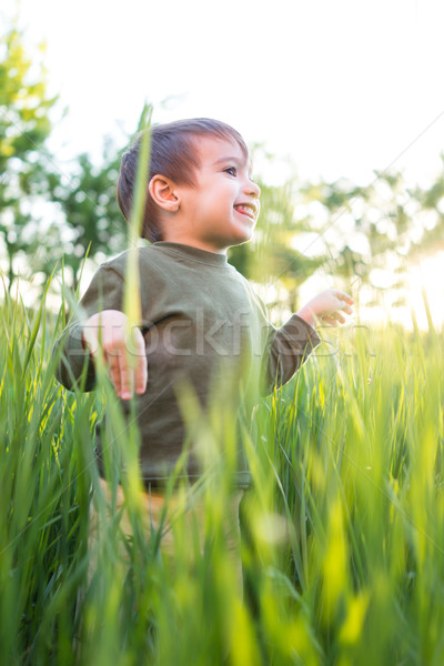 Baby in grass Stock photo © zurijeta
