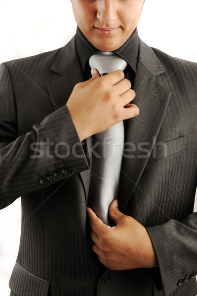Businessman adjusting his tie Stock photo © zurijeta