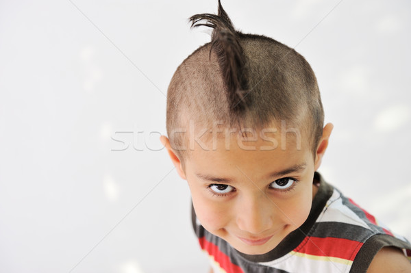 Sevimli küçük erkek komik saç yüz buruşturma Stok fotoğraf © zurijeta