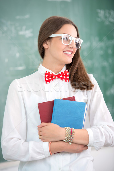 Smart schoolgirl with bowtie Stock photo © zurijeta