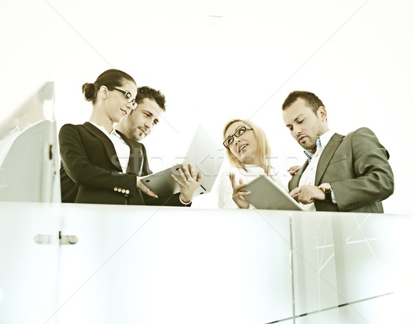 Fiiltered successful business people in real office situations Stock photo © zurijeta