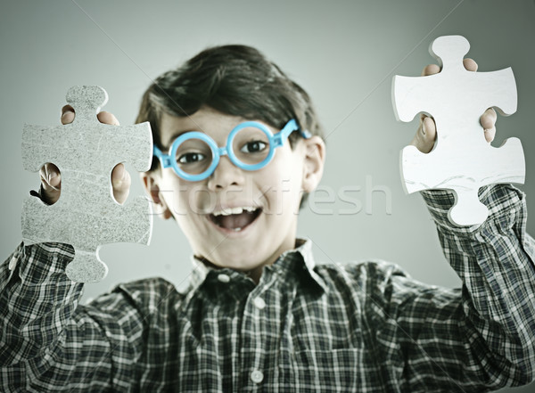 Gyerekek kapcsolódik kirakós játék üzlet arc absztrakt Stock fotó © zurijeta