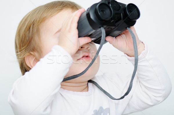 Baby with binoculars, closeup Stock photo © zurijeta
