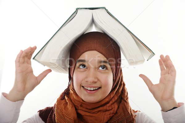 Femenino árabe estudiante equilibrio grande libro Foto stock © zurijeta