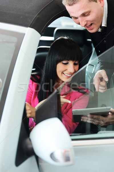 Woman buying the car and seller selling Stock photo © zurijeta