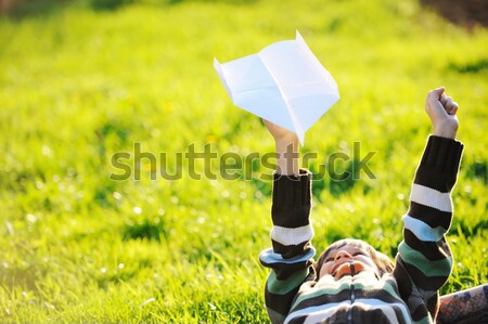 Happy kid enjoying sunny late summer and autumn day in nature on Stock photo © zurijeta