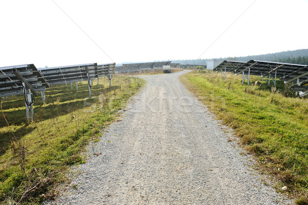 Road trough solar panels field Stock photo © zurijeta