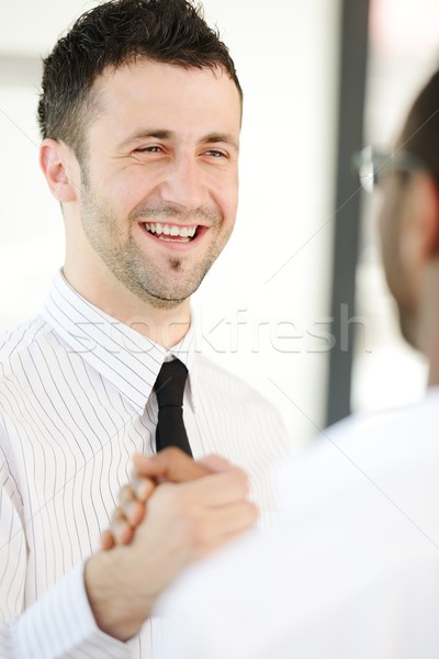 Successful business people hand shaking after great deal Stock photo © zurijeta