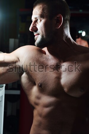 Athletic bodybuilder, execute exercise in sport gym hall Stock photo © zurijeta