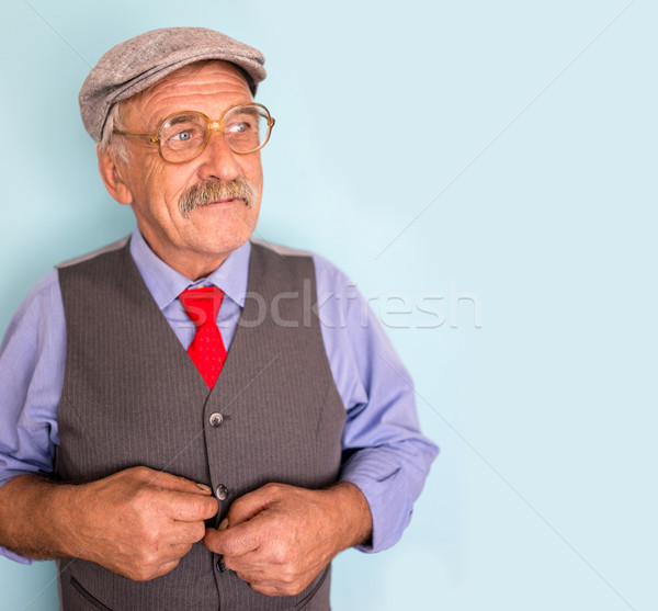 Portrait of a smiling and confident mature businessman with must Stock photo © zurijeta