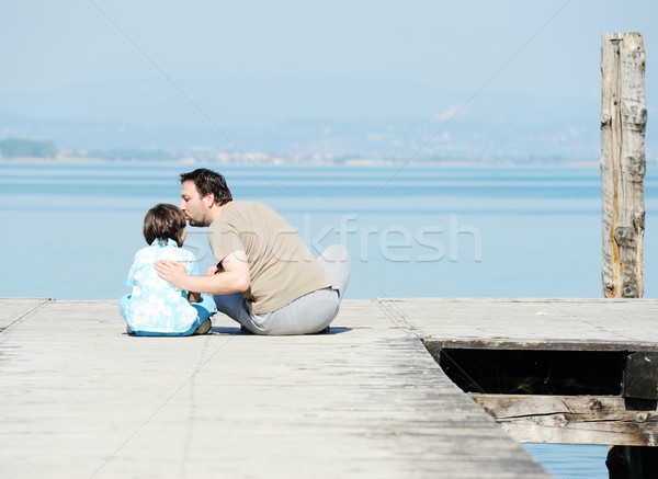 Vater-Sohn Dock schönen See Meer Strand Stock foto © zurijeta