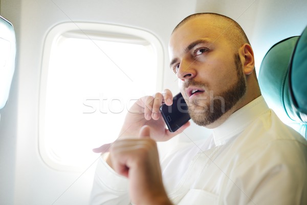 современных арабский бизнесмен внутри самолет Ближнем Востоке Сток-фото © zurijeta