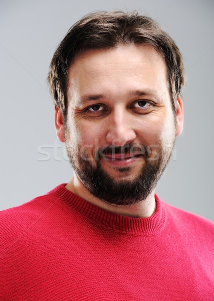 Feliz sonriendo hombre mirando cámara satisfacción Foto stock © zurijeta