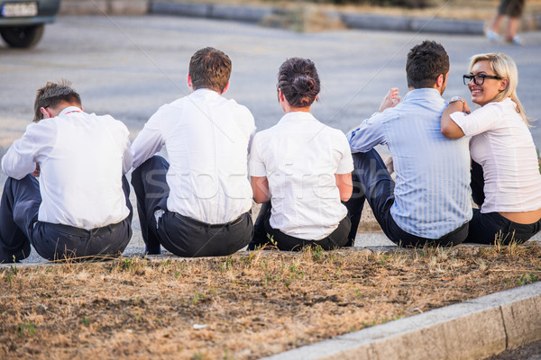 Fünf Corporate Menschen Sitzung modernen außerhalb Stock foto © zurijeta