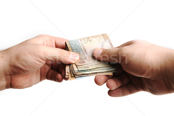 Giving money Stock photo © zurijeta