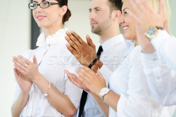 Stock photo: Business people standing in a row and applauding