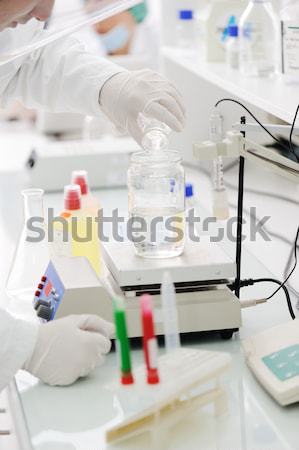 Working in lab with liquids, closeup Stock photo © zurijeta