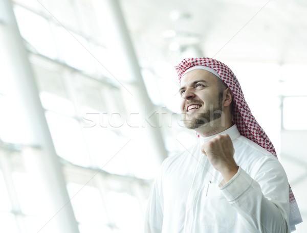 Modern Arabic businessman inside airplane Stock photo © zurijeta