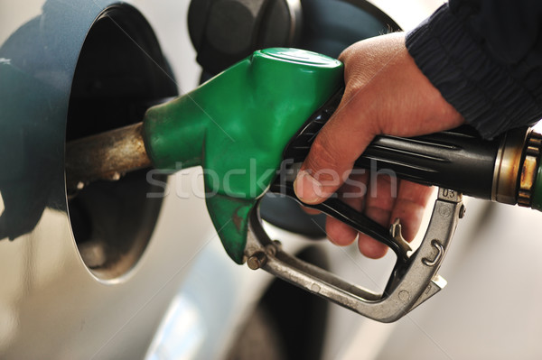 Man refilling the car with fuel on a filling station Stock photo © zurijeta