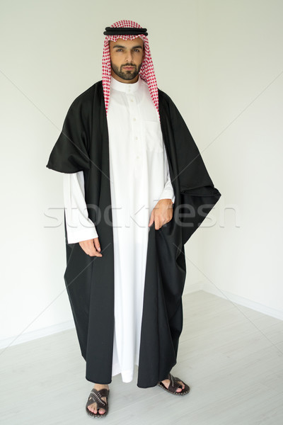 Portrait of attractive Arab man with sheikh robe Stock photo © zurijeta