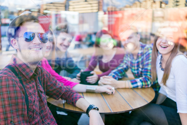 Authentic image of young real people having good time together Stock photo © zurijeta