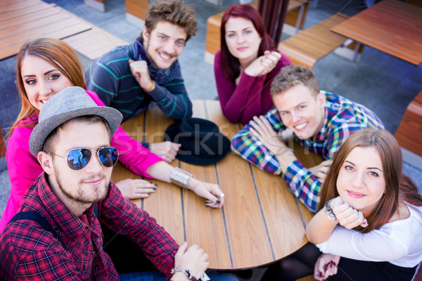 Authentic image of young real people having good time together Stock photo © zurijeta