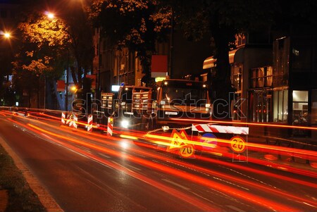 Colorful scene of traffic at night and workin area beside Stock photo © zurijeta